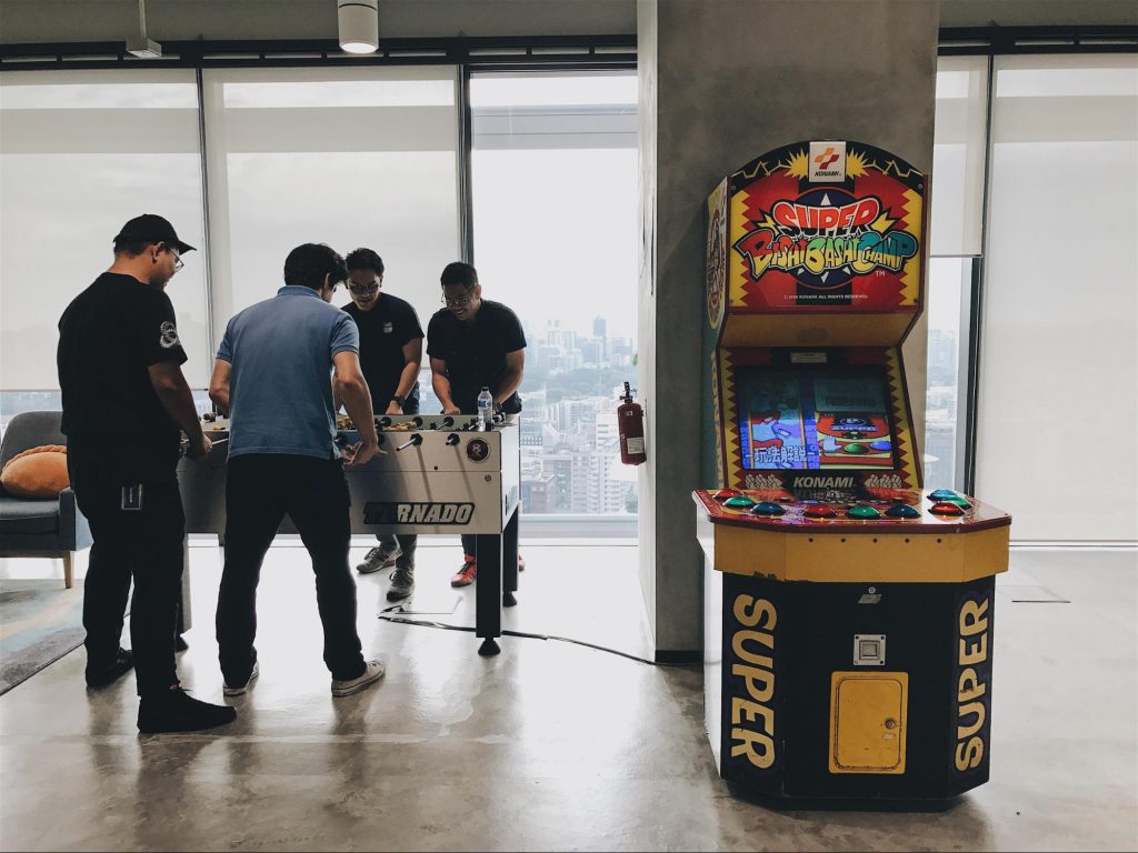 Facebook's game room with foosball table and arcade machine